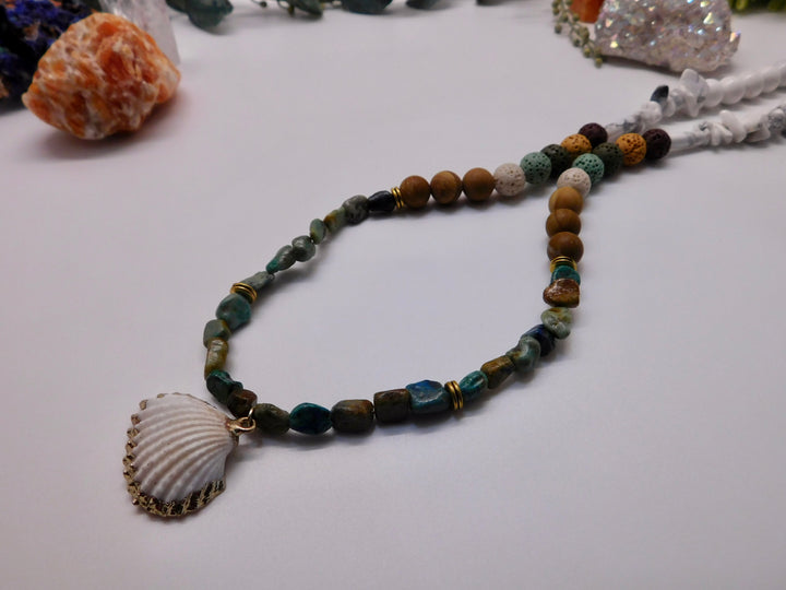 Bohemian Chrysocolla necklace with shell charm and Howlite accents.